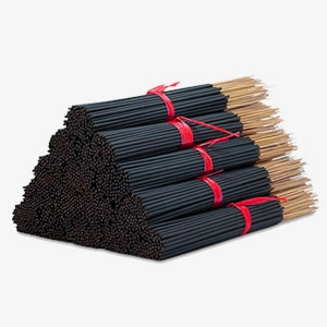 Premium Raw Agarbatti Sticks Manufacturers & Wholesaler in India Premium undipped incense sticks on conveyor belt at India's agarbatti production facility.